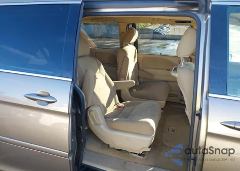 2010 Honda Odyssey Ex z USA, uszkodzony, nr VIN 5FNRL3H46AB016388